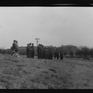 Drum and Bugle Corps and Pershing Rifle Squad saluting foreign officers
