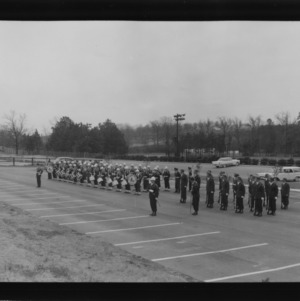 Drum and Bugle Corps and Pershing Rifle Squad saluting foreign officers