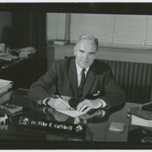 Chancellor John T. Caldwell at Desk