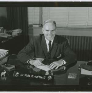 Chancellor John T. Caldwell at Desk