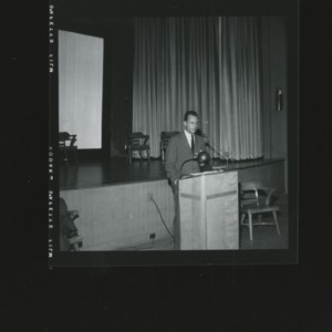 Man giving speech at podium