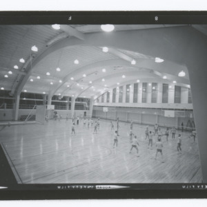 Volleyball class in gymnasium