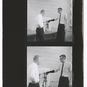 Chemical engineering student with apparatus at Engineers' Fair 1962