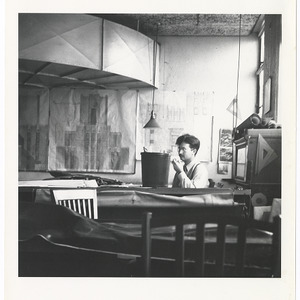 Dean Henry Kamphoefner at desk
